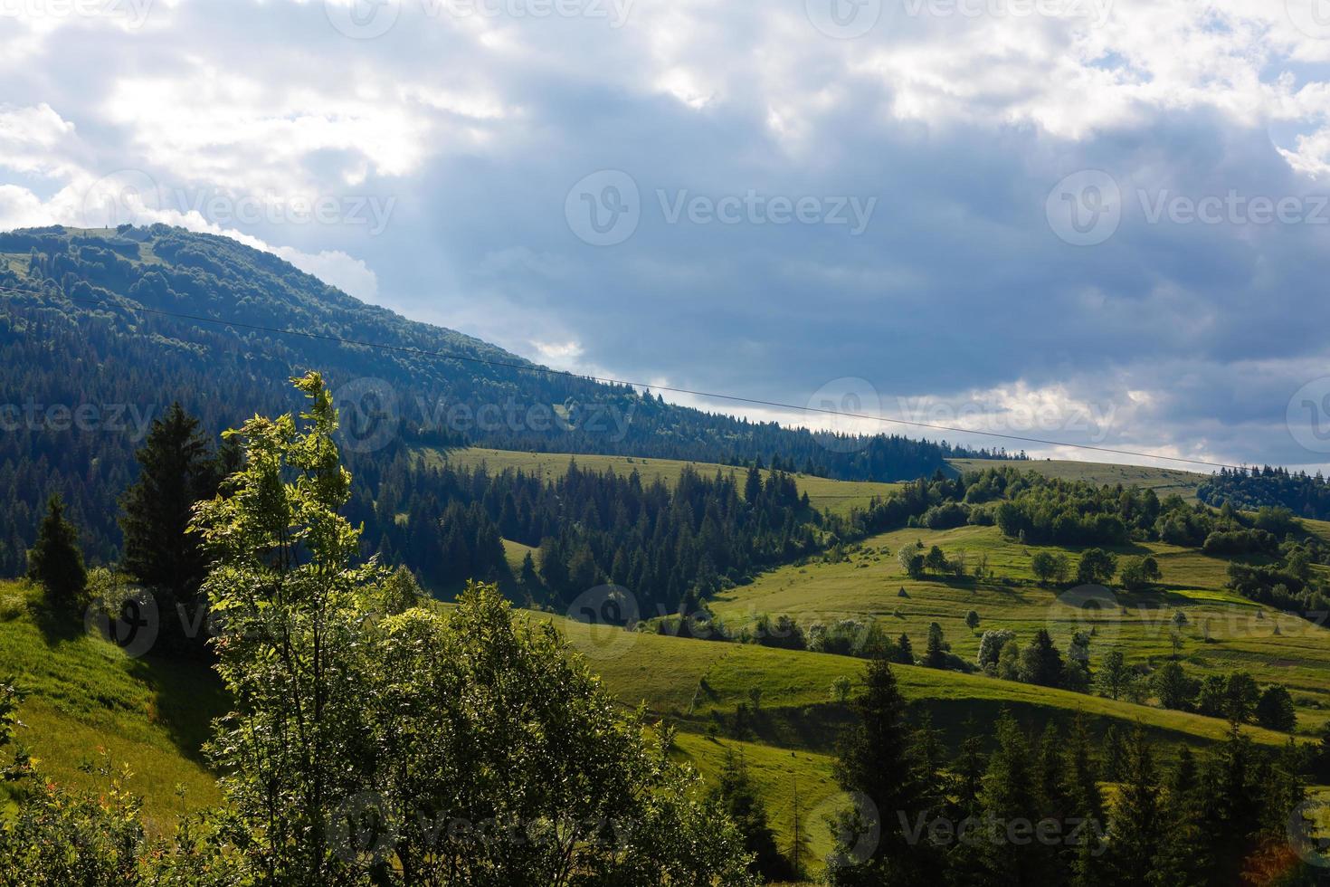 Beautiful sunny day is in mountain landscape. Carpathian, Ukraine. photo