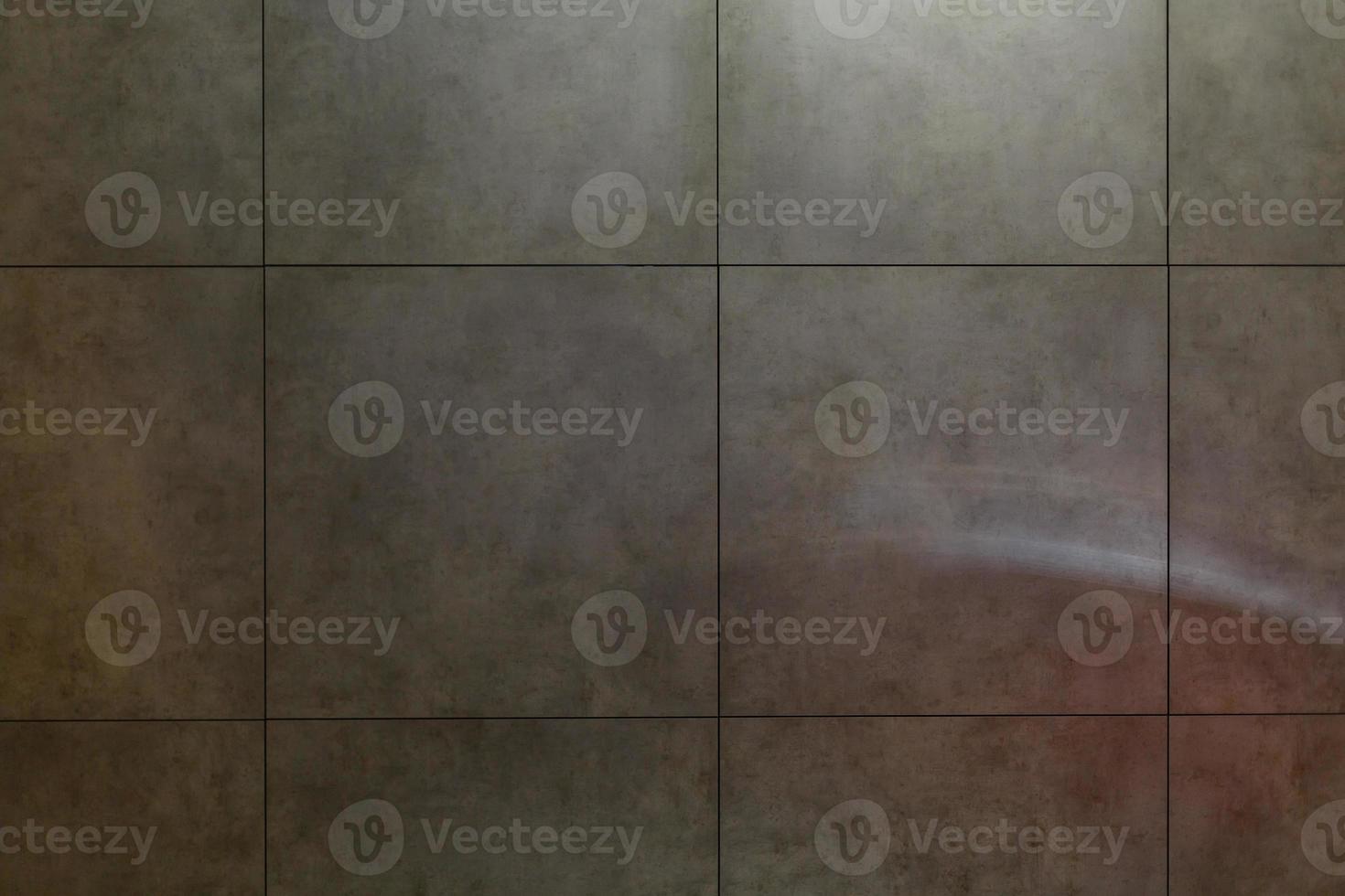 Wall grey tiles background. photo