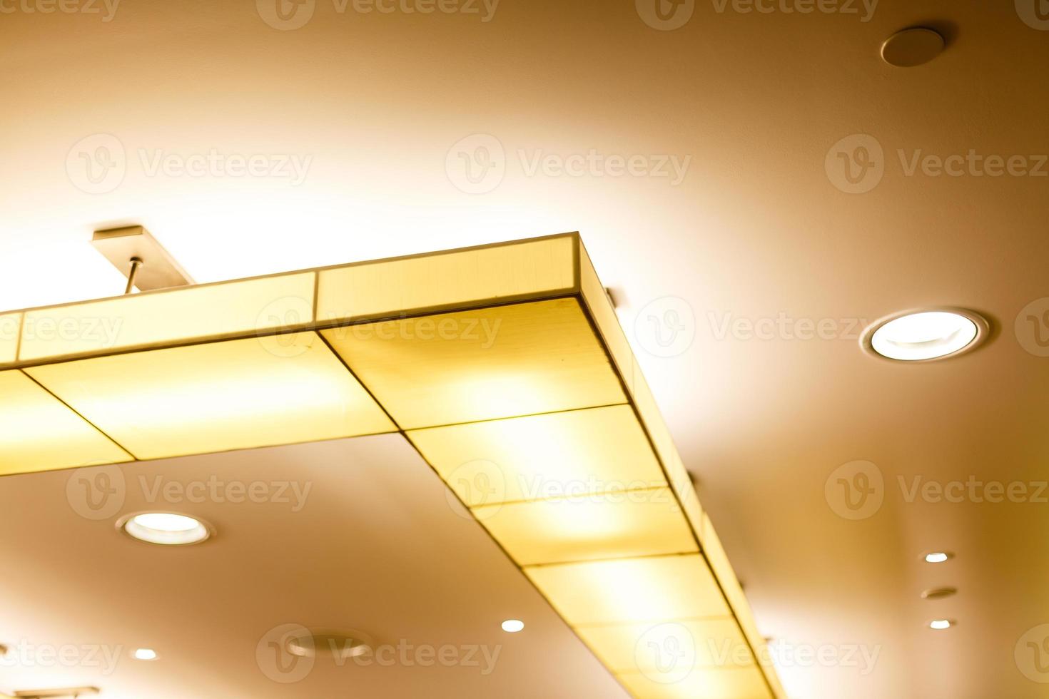 White ceiling with neon light bulbs in uprisen view photo