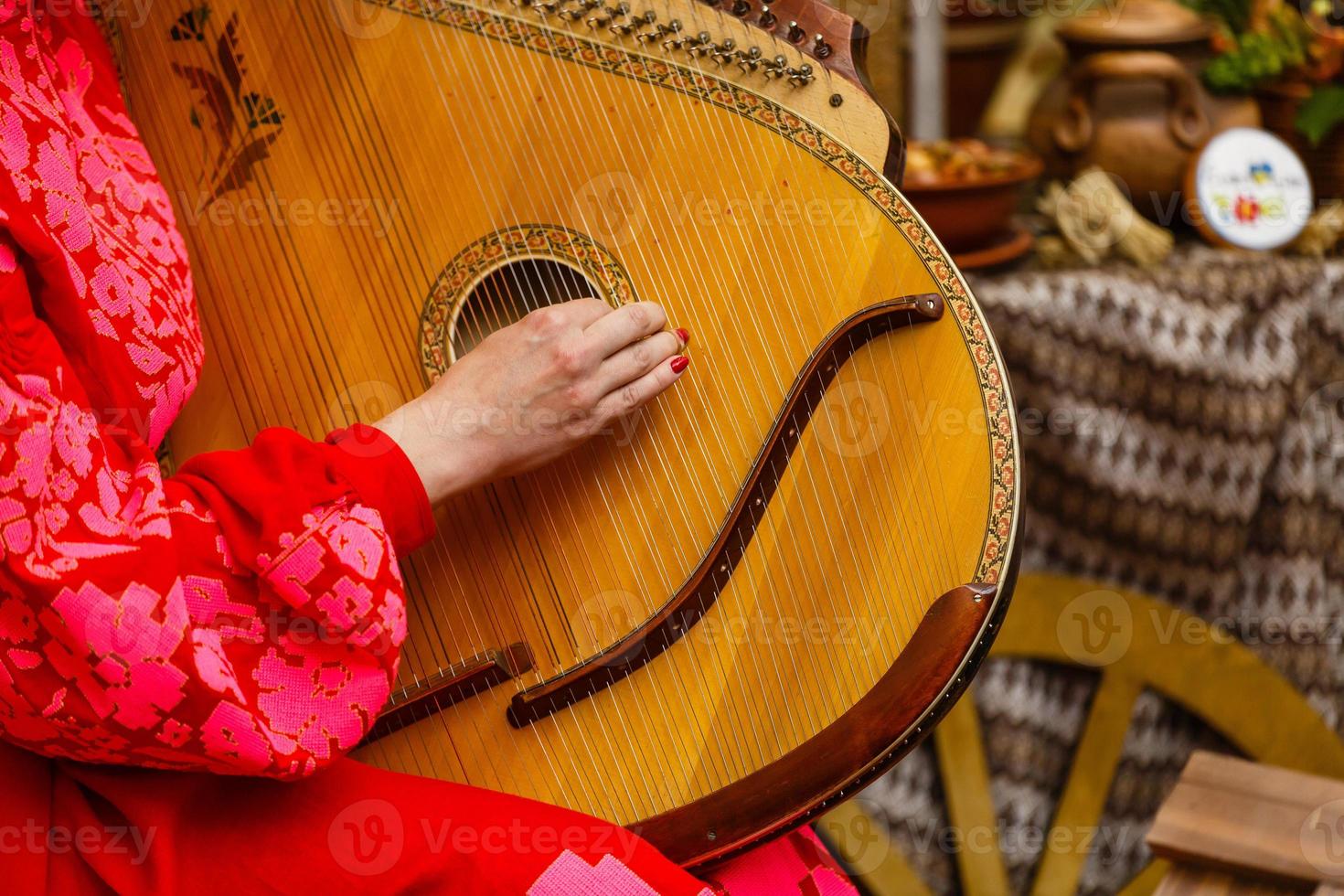 girl playing the bandura photo