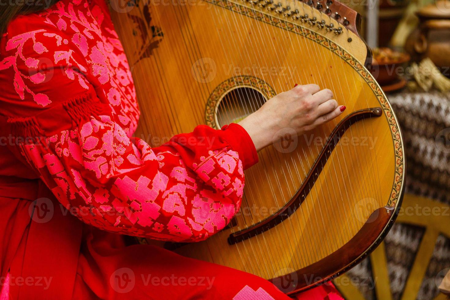girl playing the bandura photo