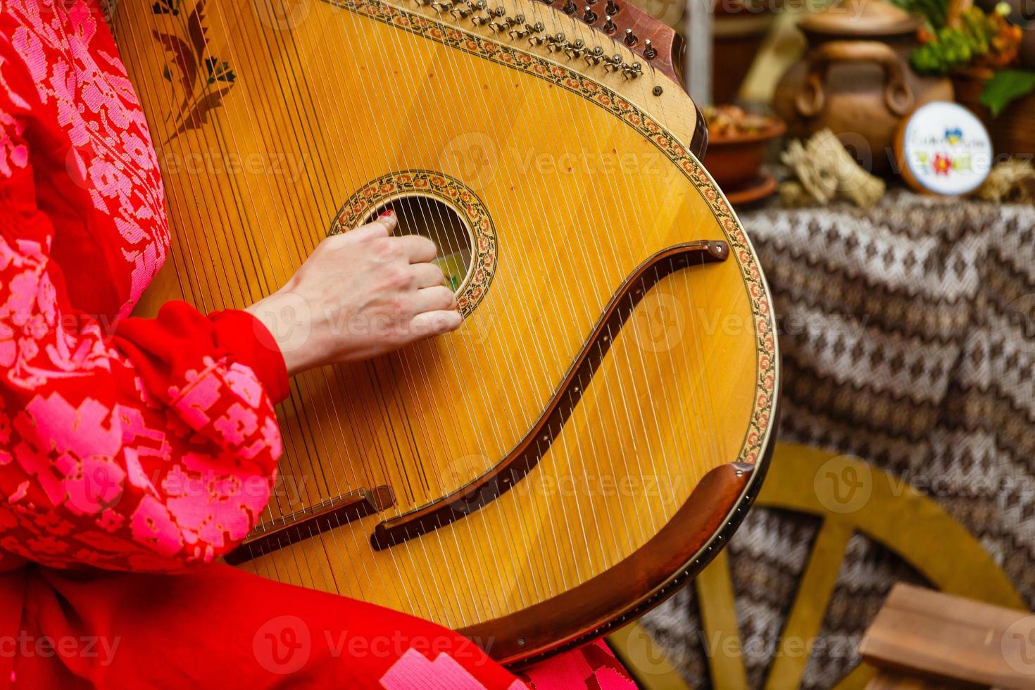 girl playing the bandura photo