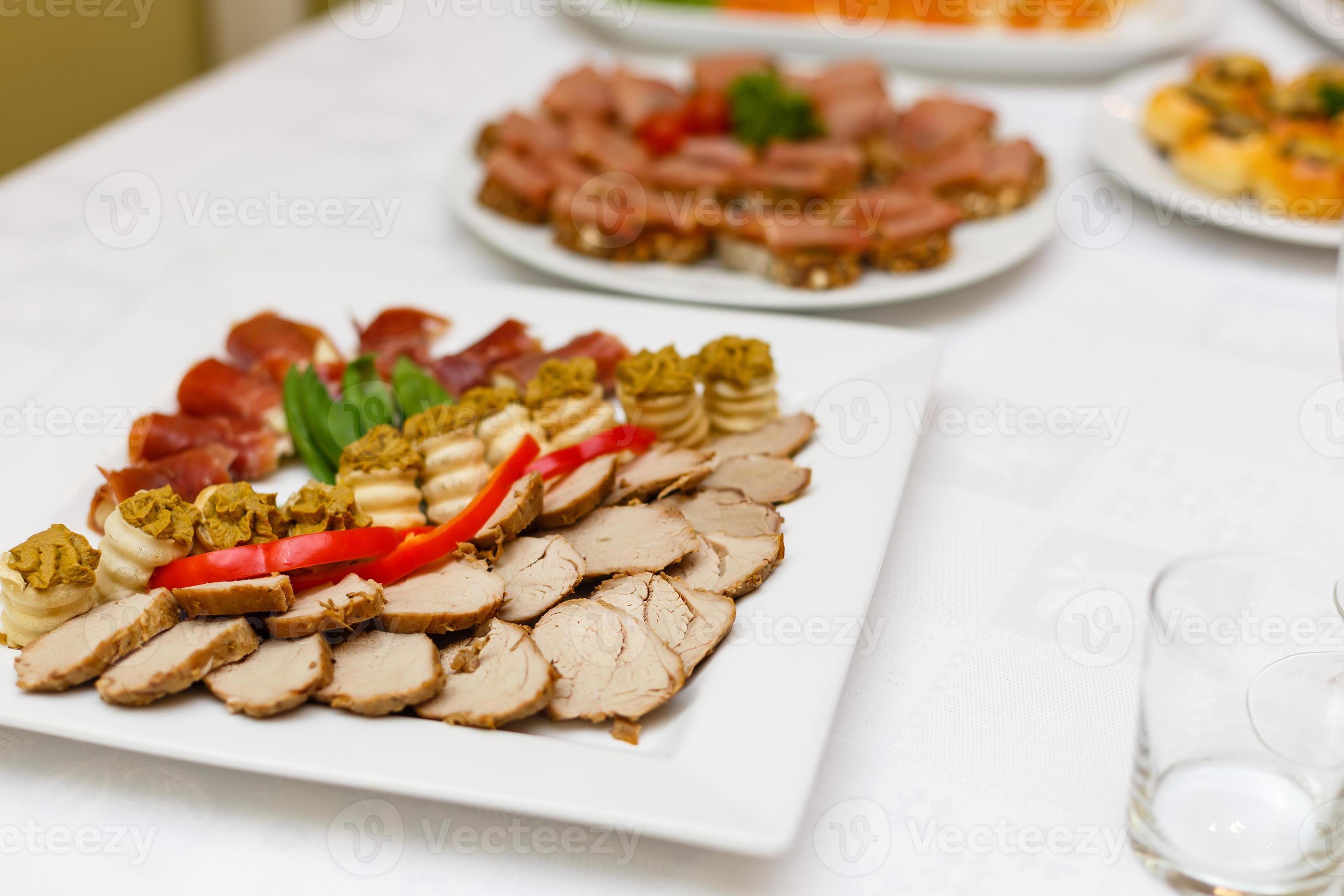 Delicious buffet table at a luxury event spread with a variety of cold