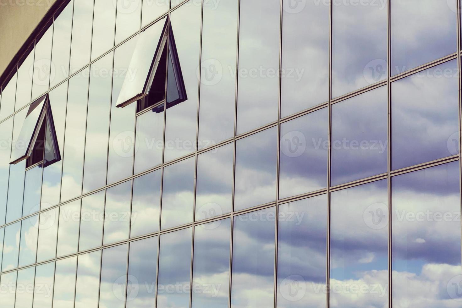 modern blue glass wall of skyscraper Office building close up photo