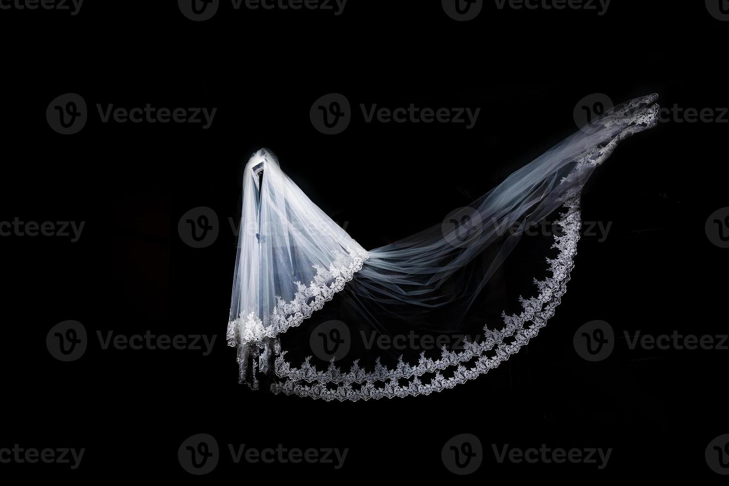 wedding white Bridal veil on black background isolated photo