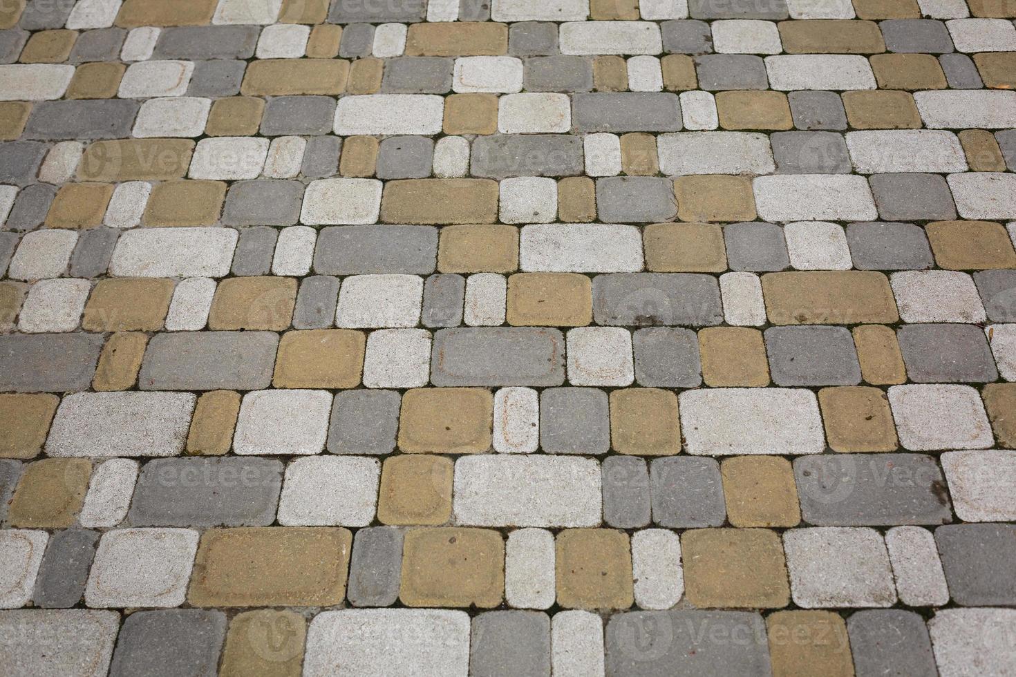 Closeup of Grunge Textured Brick Wall With Different Colors photo