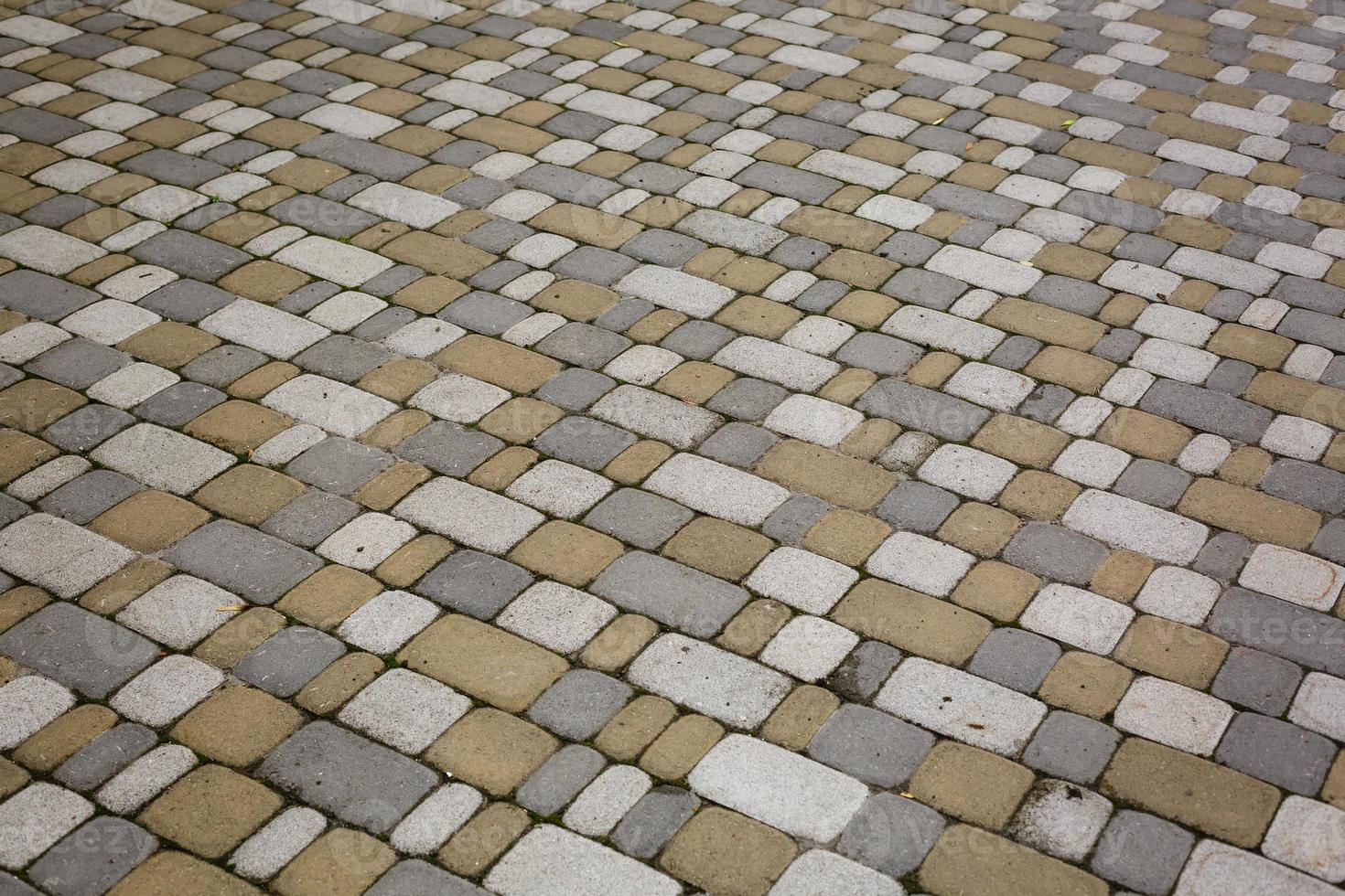 Closeup of Grunge Textured Brick Wall With Different Colors photo