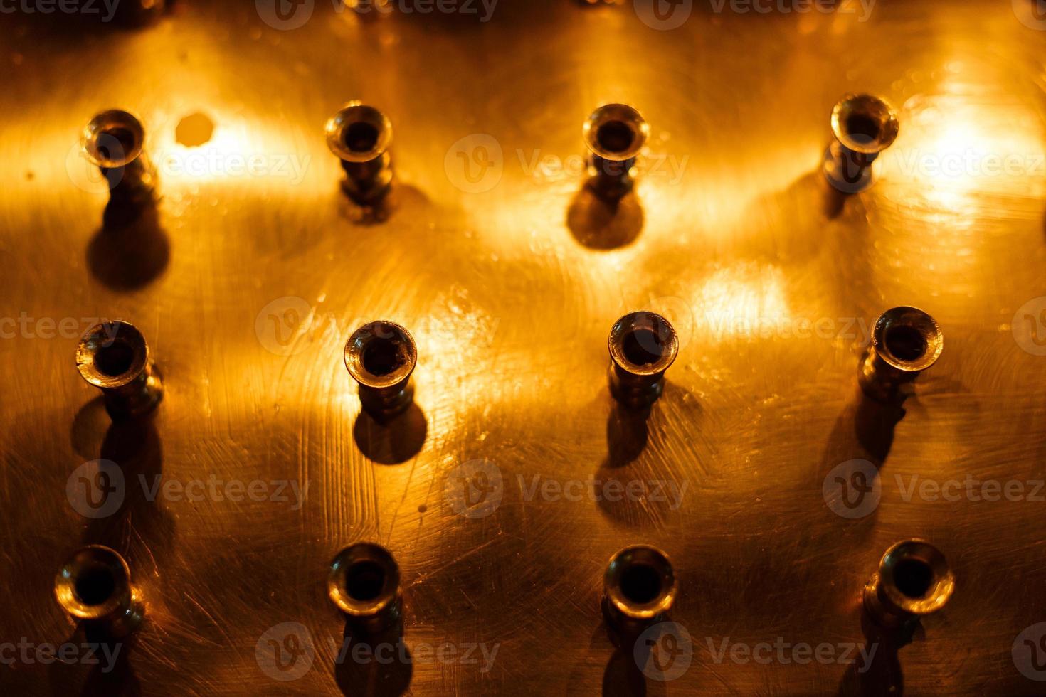 Empty candlestick in the church as a symbol photo