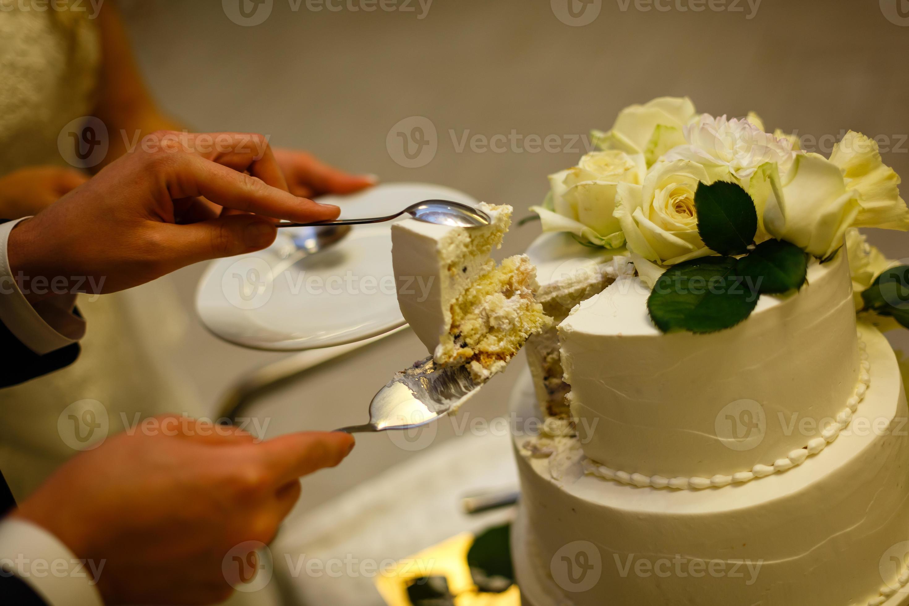 White wedding cake with real roses decorations 17660064 Stock Photo at