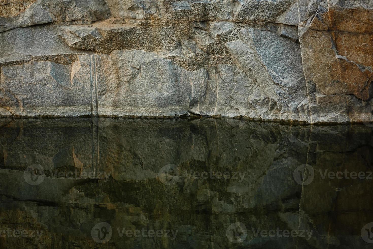 Quarry rocks with reflection photo