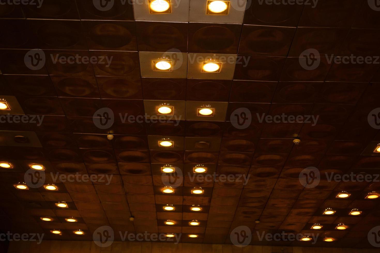 White ceiling with neon light bulbs in uprisen view photo