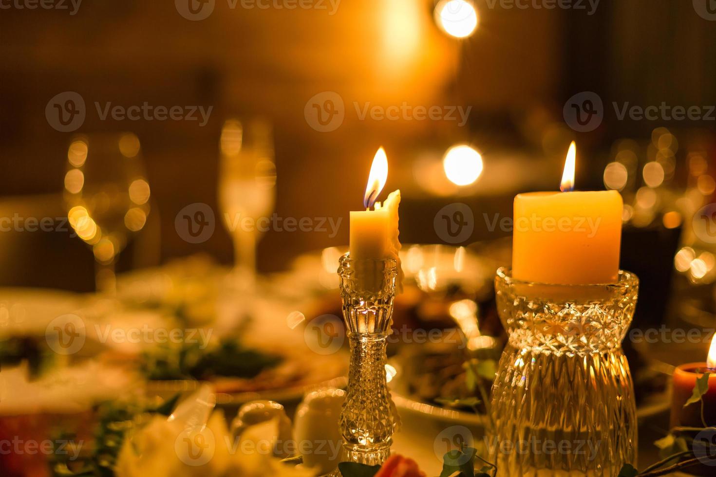 Candle in a crystal candlestick photo