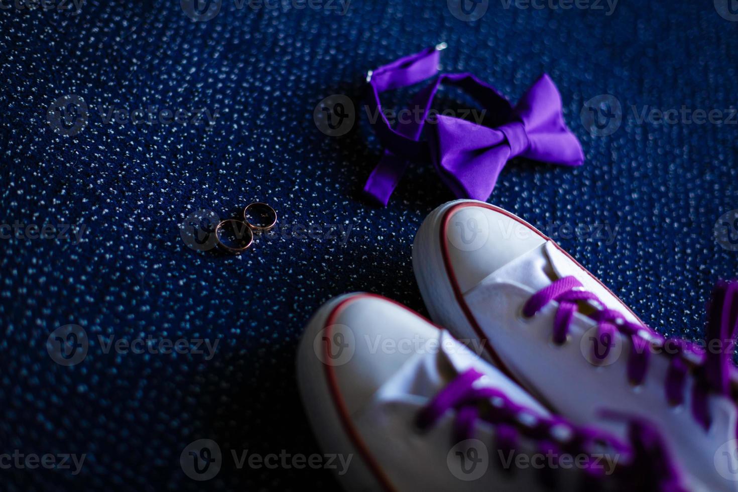 Men's shoes, tie, cufflinks on the wooden background. Groom's accessories photo