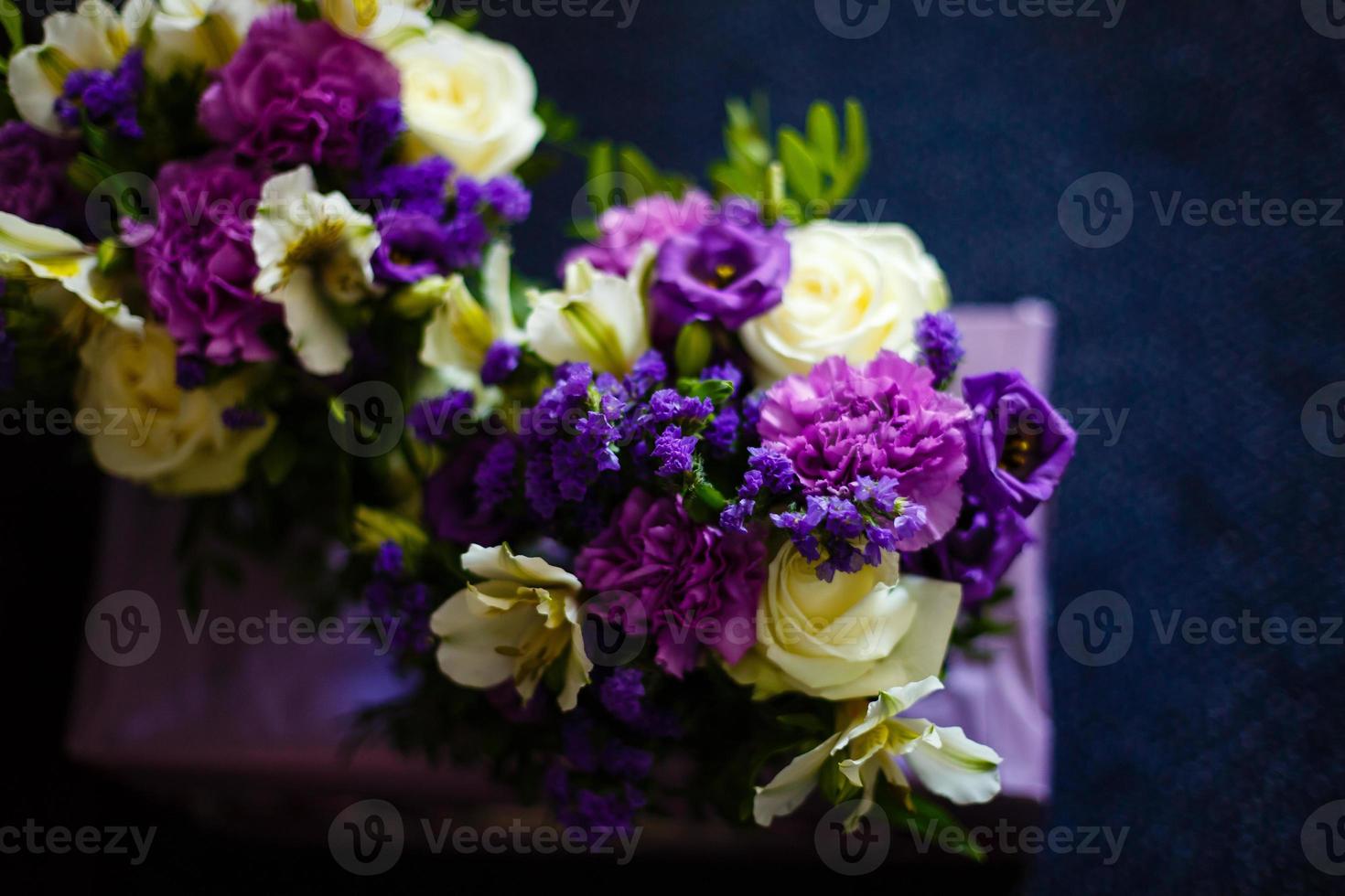 Purple and pink rose bridal bouquet photo