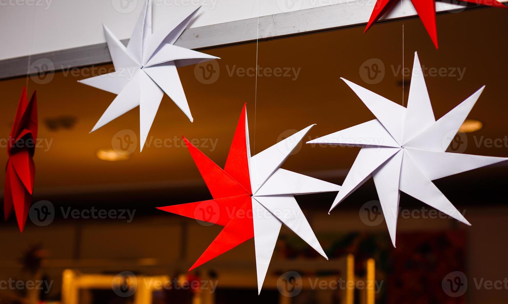 red and white paper stars christmas decor photo