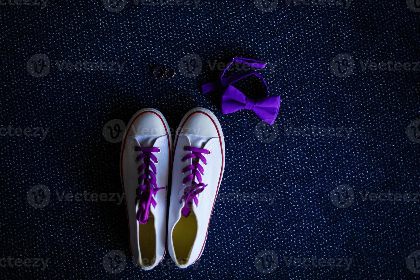 Men's shoes, tie, cufflinks on the wooden background. Groom's accessories photo