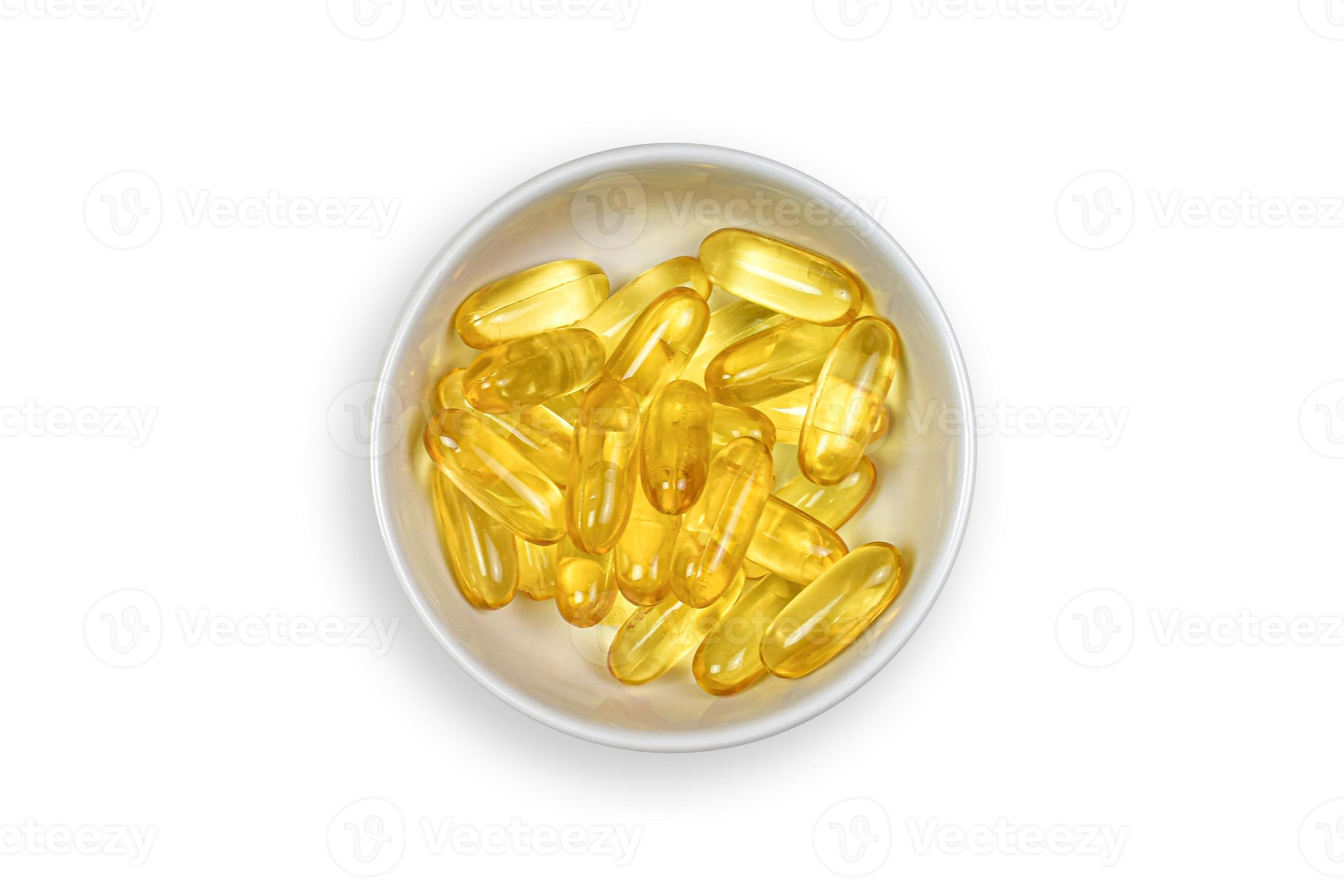 Clipping Path. Close up of Fish oil capsule in bowl isolated white
