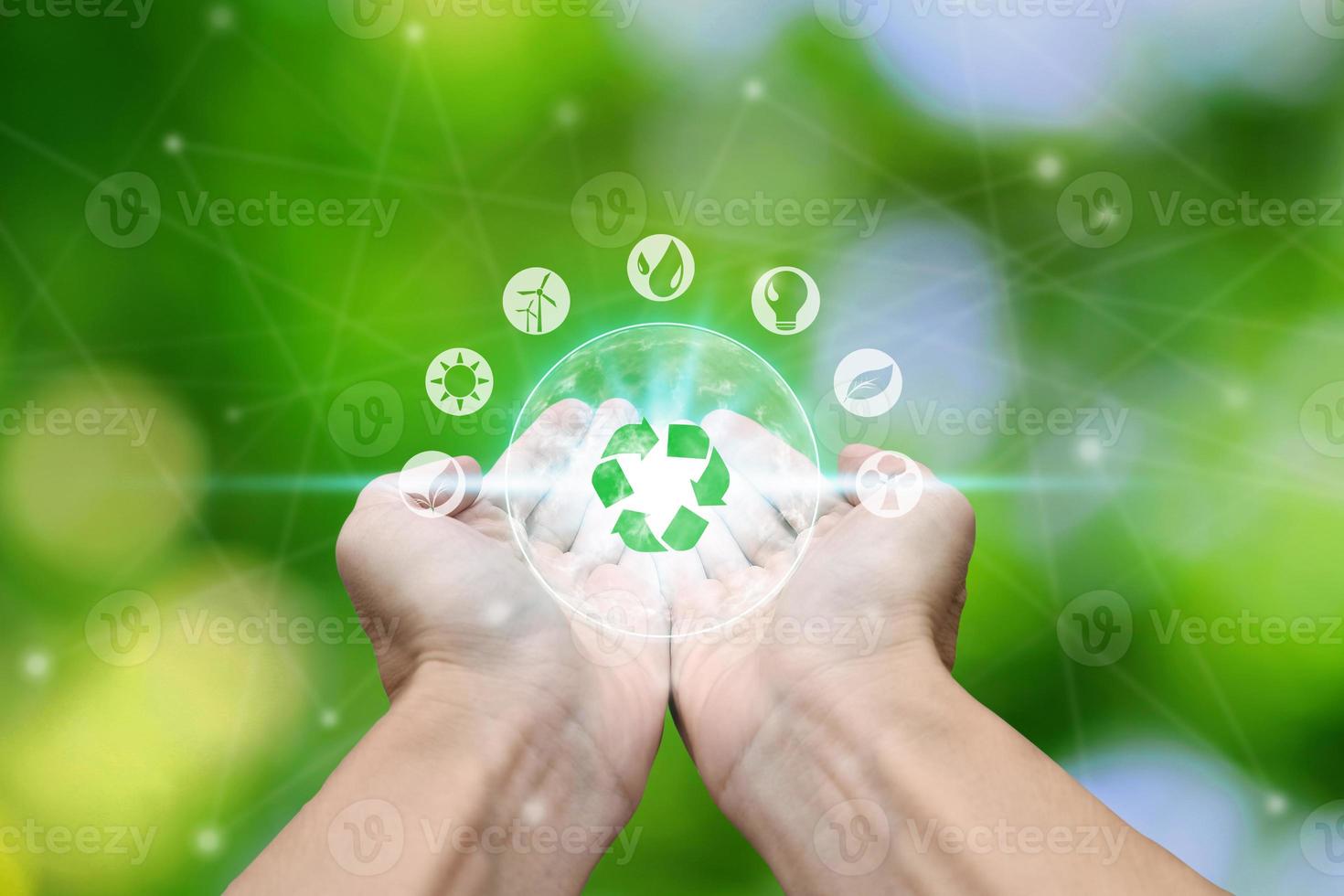 Hand holding with environment icons photo