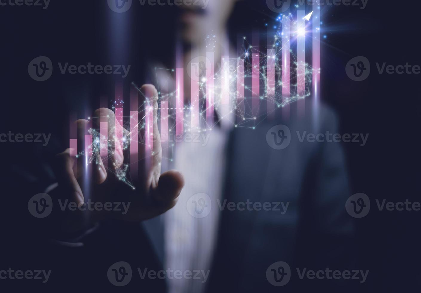 Businessman holding a graph goal of business Investor,analysis economic and calculates financial data and target for long-term investments and profitability in future on digital data system manager. photo