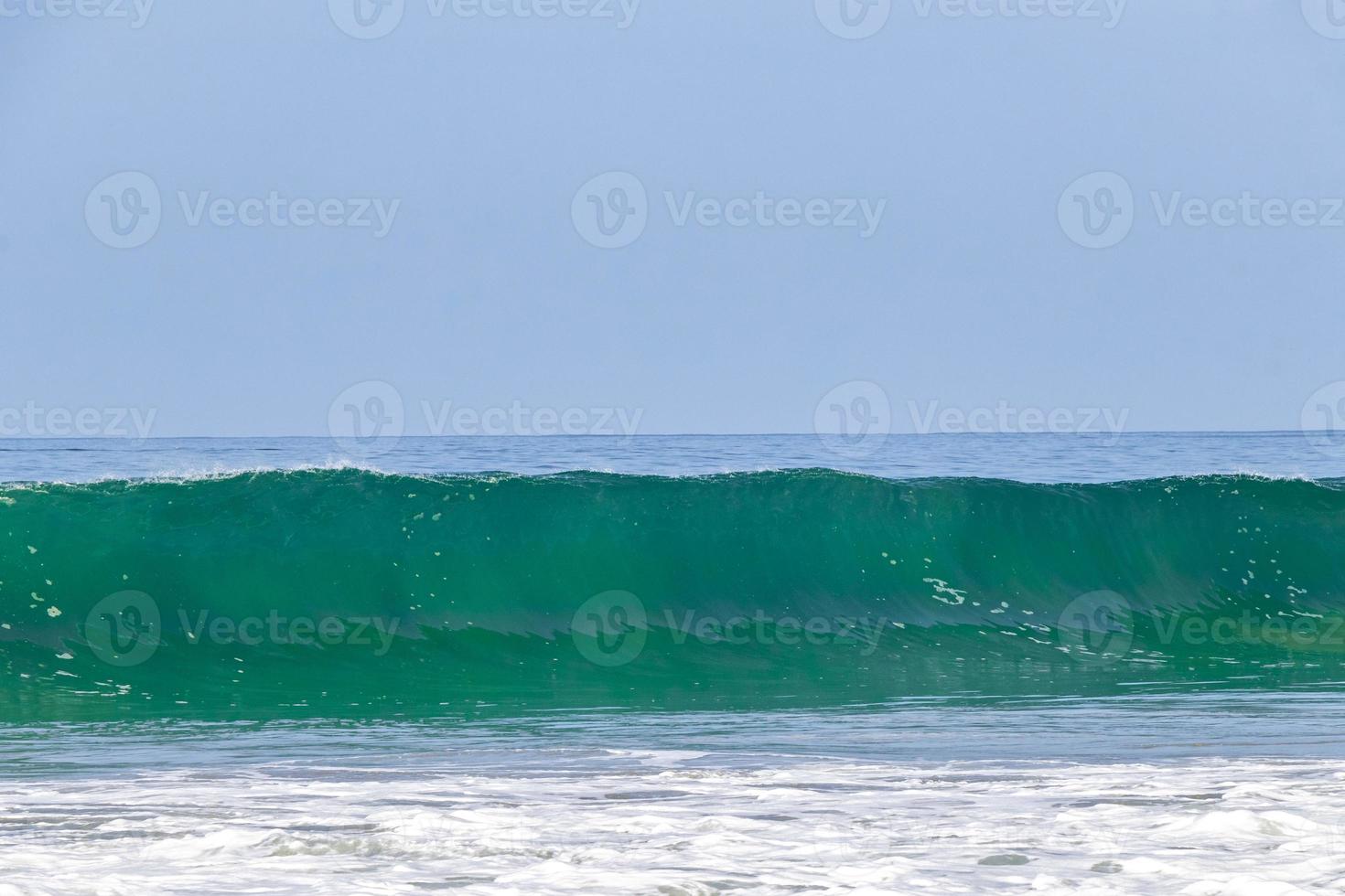 Extremely huge big surfer waves at beach Puerto Escondido Mexico. photo