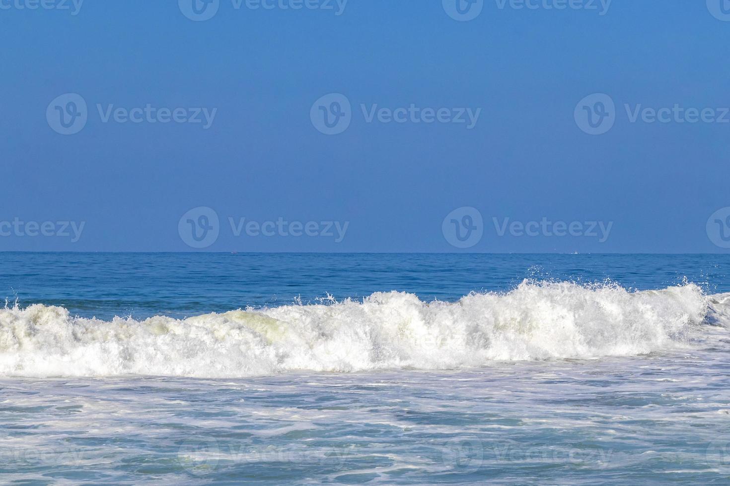Extremely huge big surfer waves at beach Puerto Escondido Mexico. photo