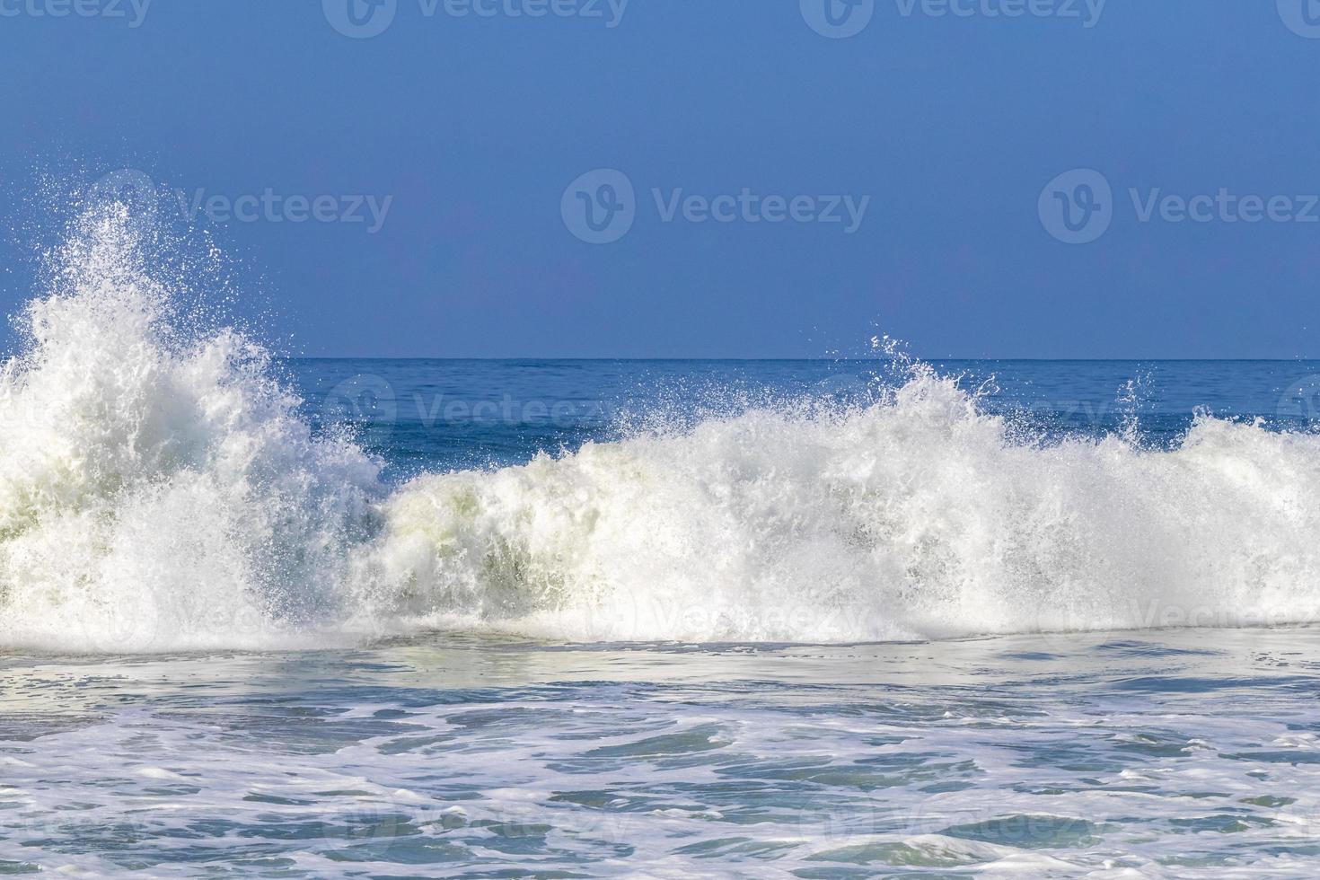 Extremely huge big surfer waves at beach Puerto Escondido Mexico. photo