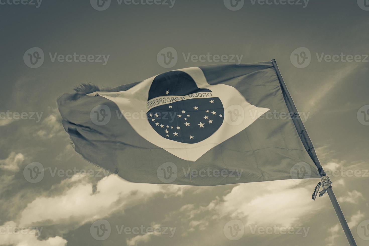 Brazilian flag with blue sky background Rio de Janeiro Brazil. photo