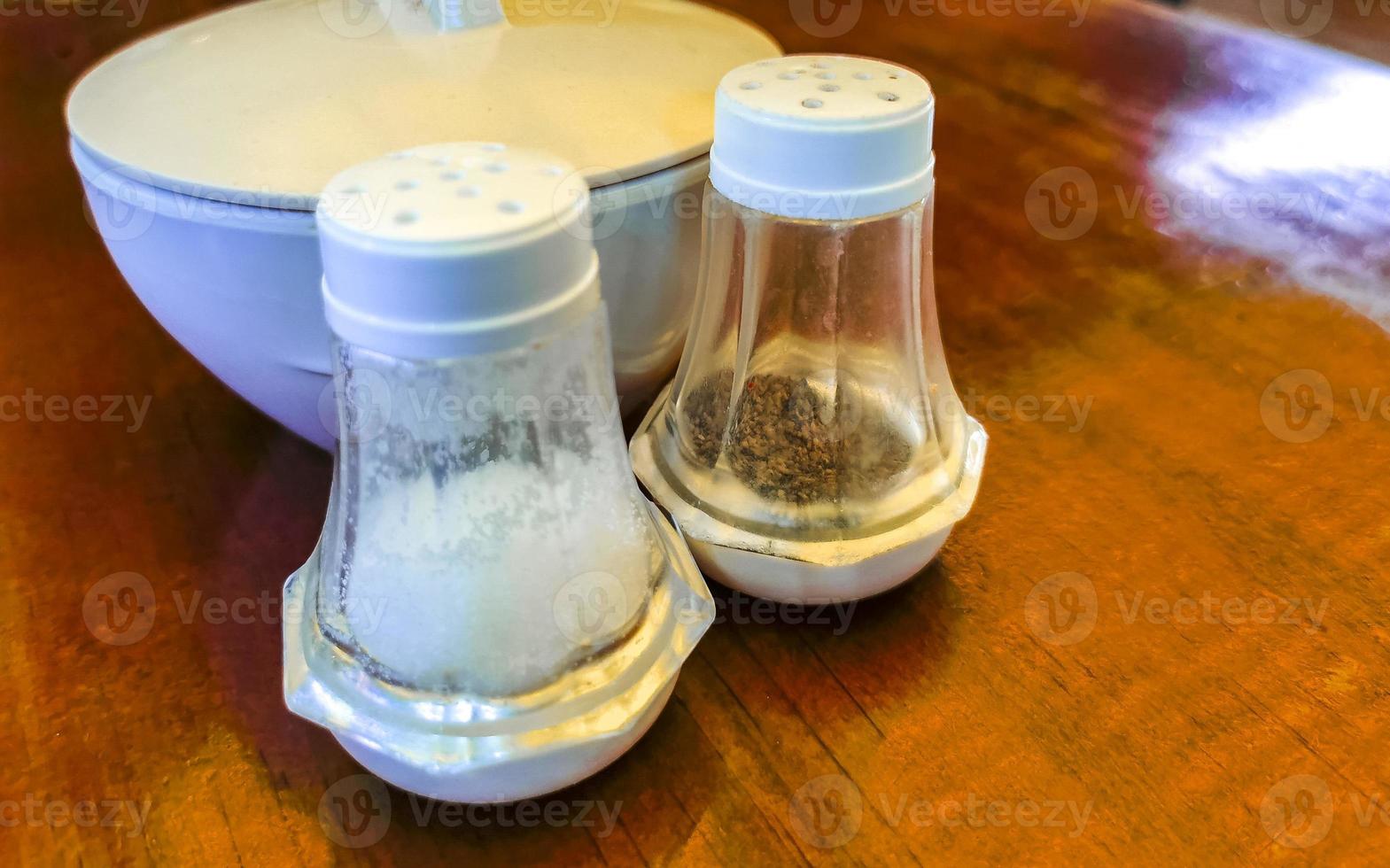 Sugar salt and pepper shaker in restaurant in Mexico. photo