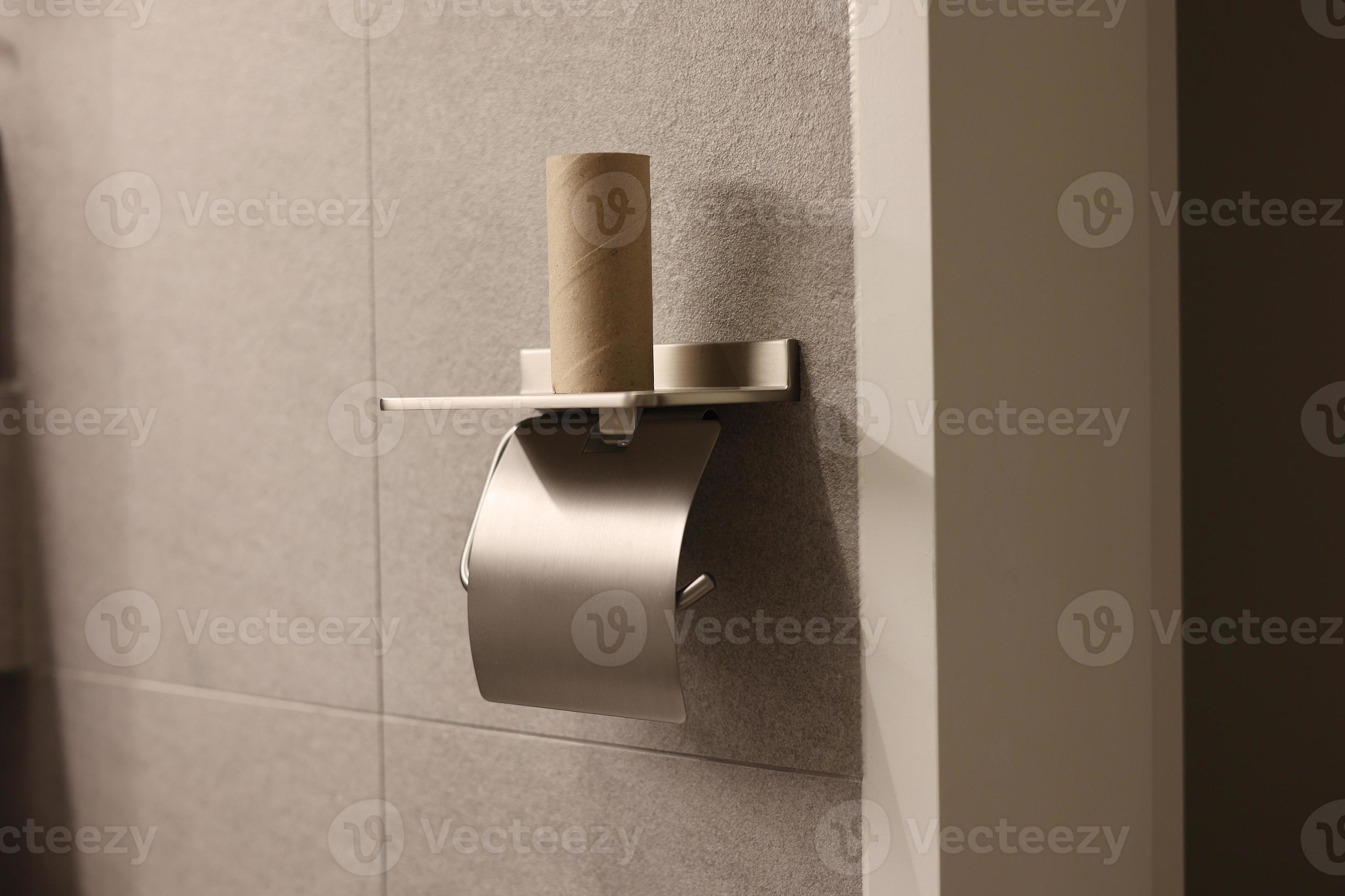 Toilet paper holder without a toilet paper 17668381 Stock Photo at Vecteezy