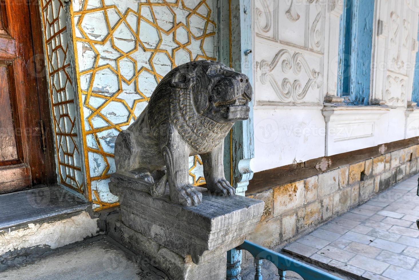 Lion statue at Sitorai Mokhi Khosa  the Summer Palace of Bukharan Emirs in Uzbekistan photo