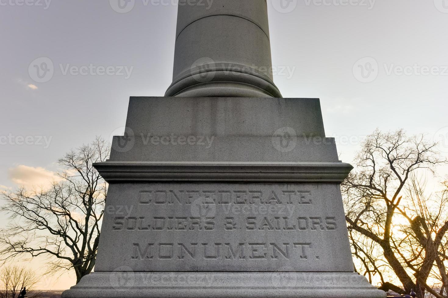 Confederate Soldiers  Sailors Monument It depicts a bronze Confederate private standing on top of the pillar which is composed of 13 granite blocks to symbolize each of the Confederate states photo