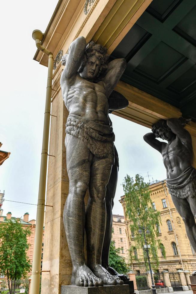 Portico With Atlantes New Hermitage in St Petersburg Russia photo