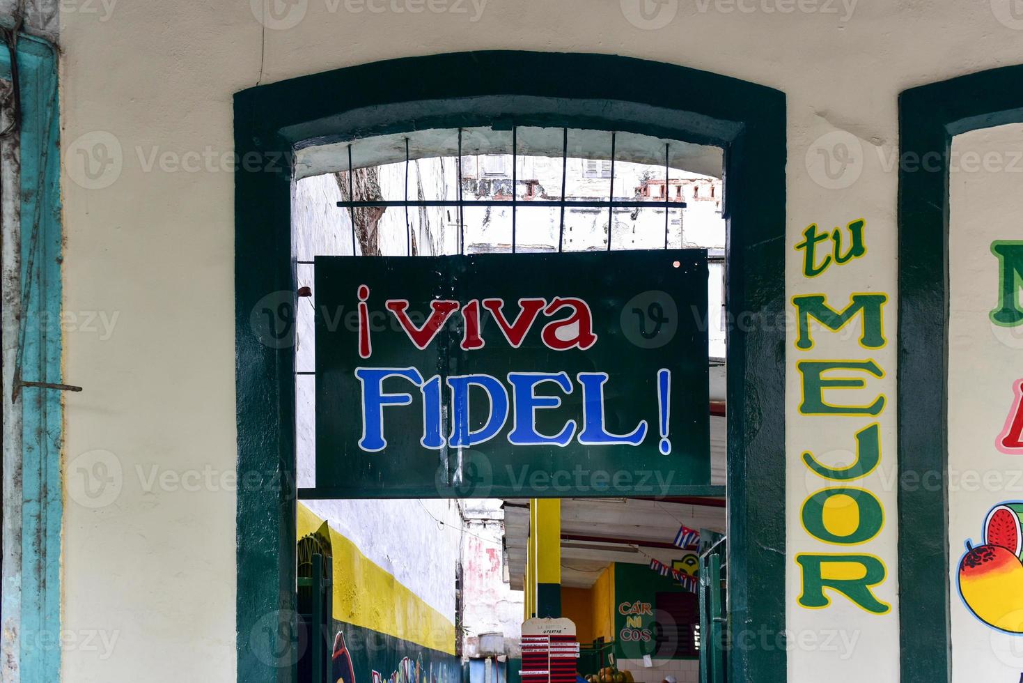 Entrance to a fruit stand in Old Havana Cuba with the words Live Fidel photo