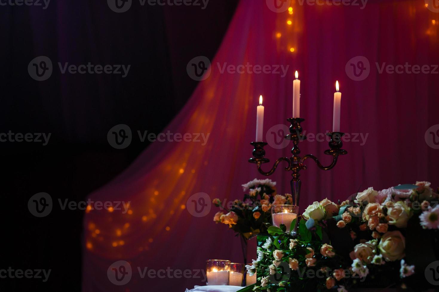 wedding candlestick with flower decoration before wedding ceremony photo