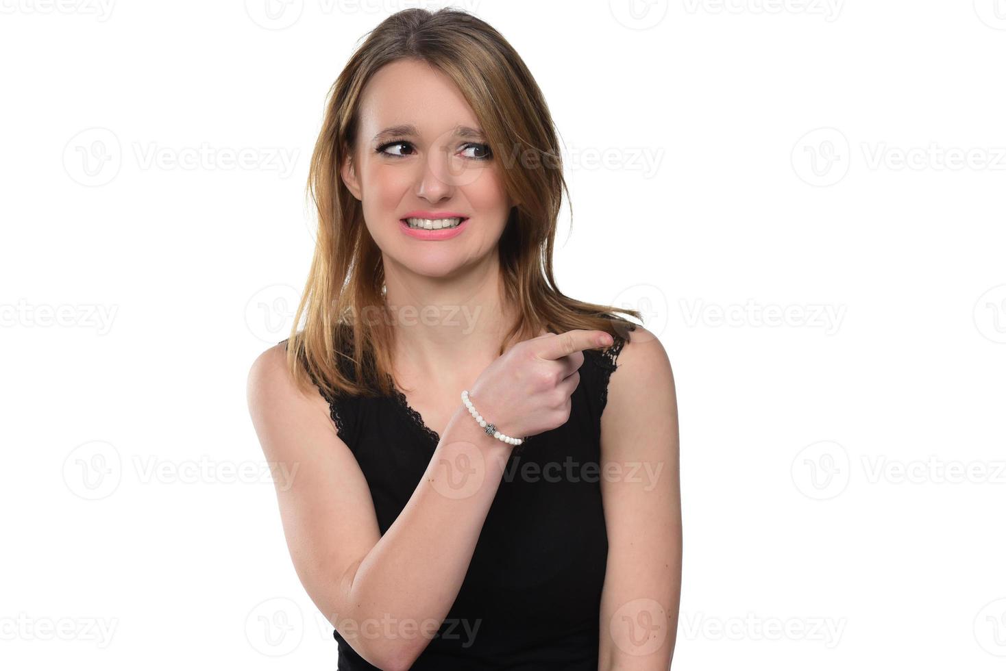 Portrait of young beautiful woman holding imaginary object on the palm .isolated on white photo