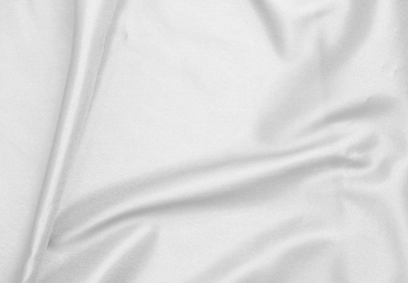 Smooth elegant white silk fabric or satin luxury cloth texture for abstract background photo