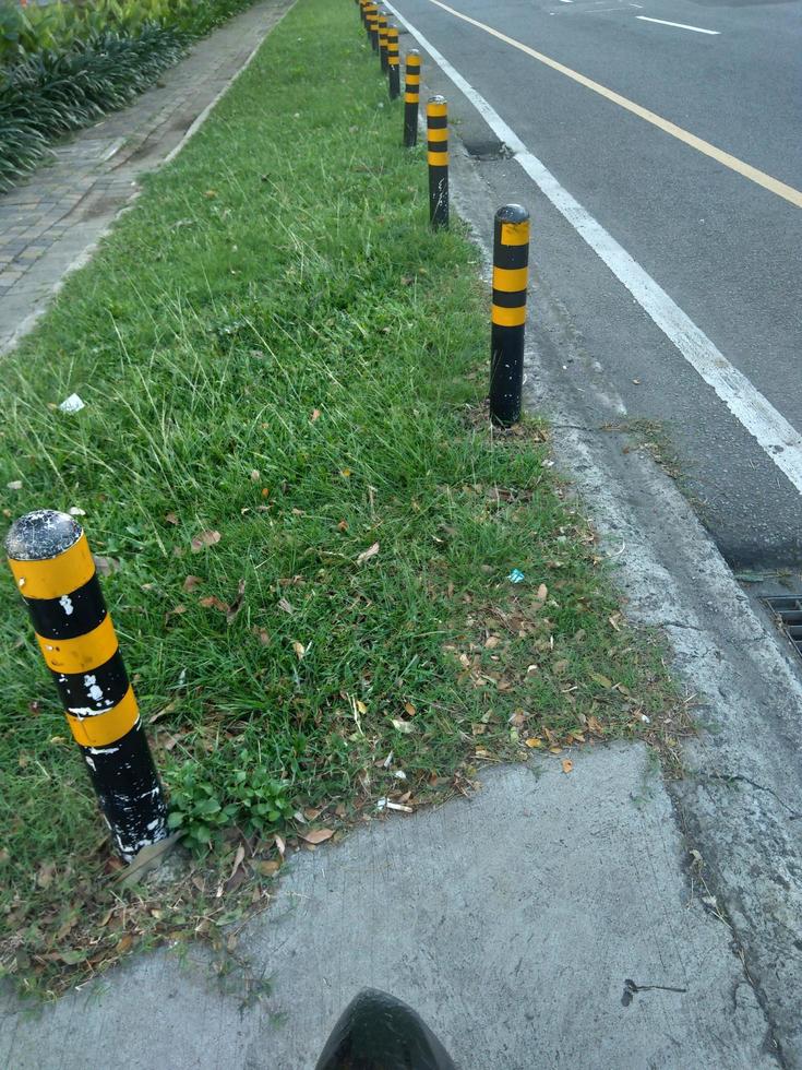 sidewalk with divider view photo