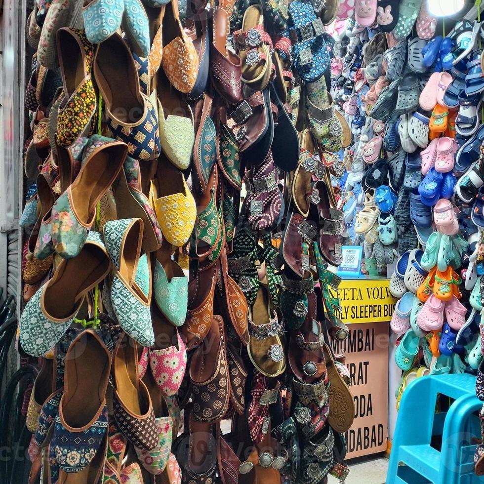 Collection of latest Juttis traditional shoes, Mahabaleshwar, India. photo