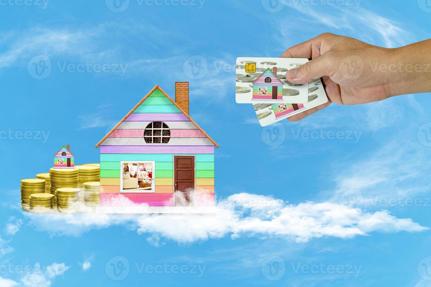 Start creating family with home and coin on white cloud and blue sky background,Dream family concepts photo