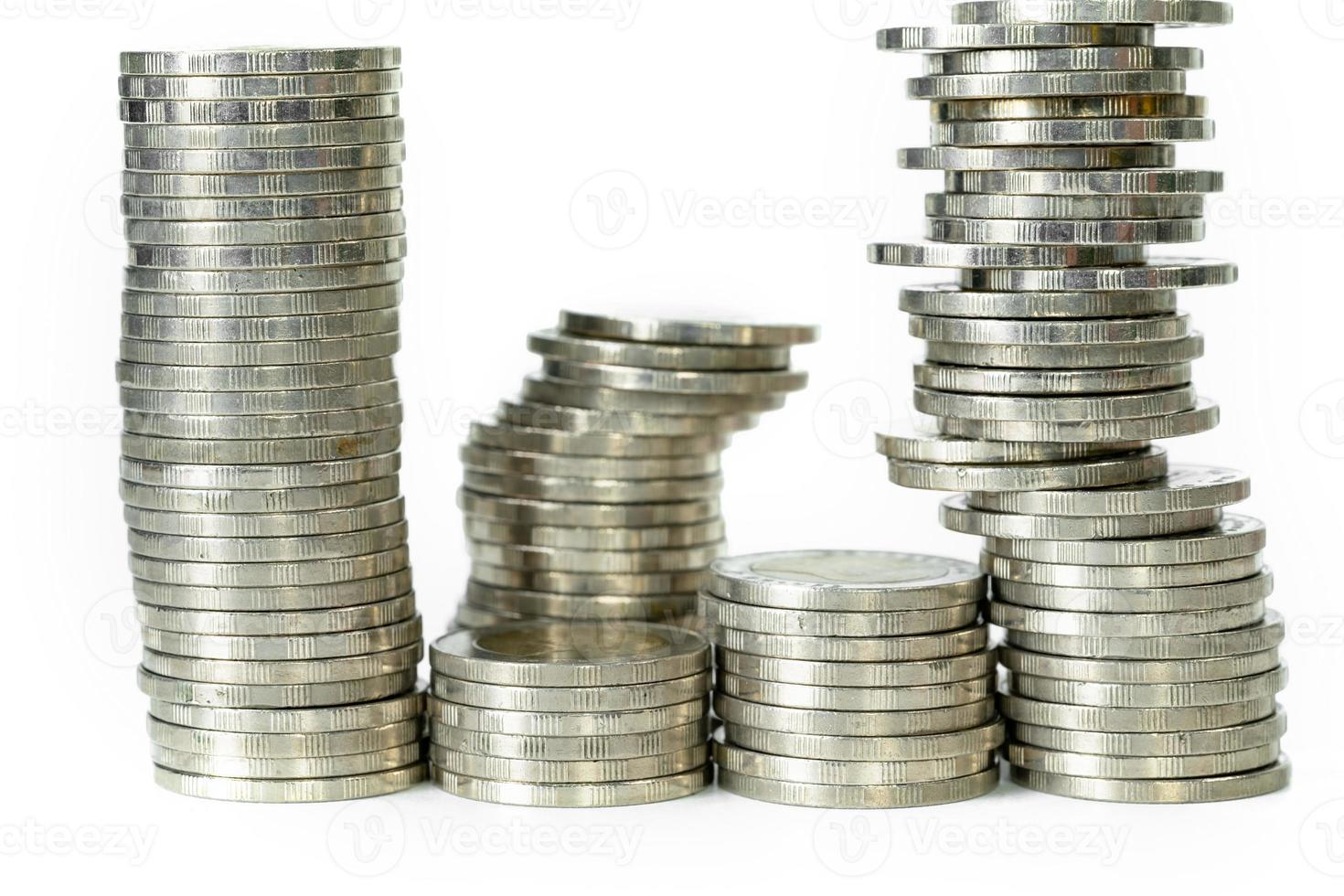 Saving money concept of business concept with coin stacks isolated on white background photo