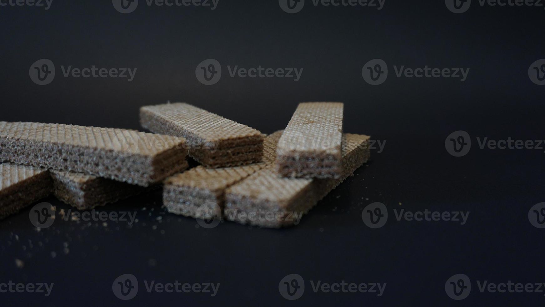 chocolate wafer on black background. photo