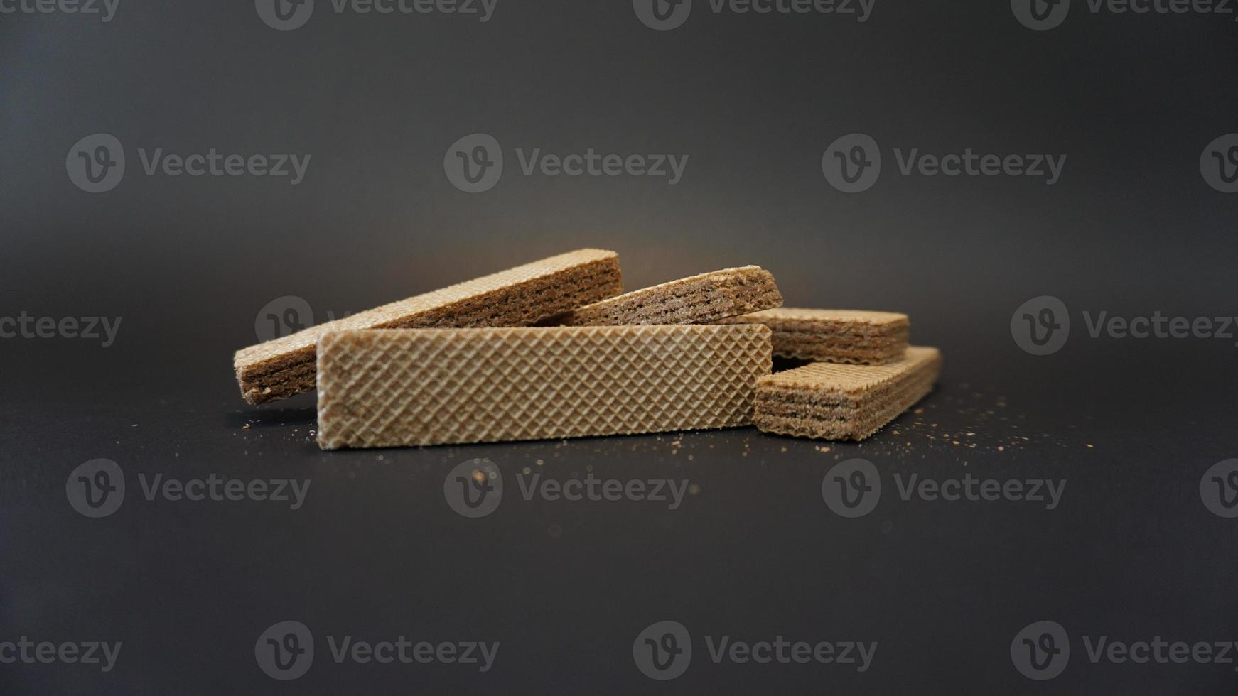 chocolate wafer on black background. photo
