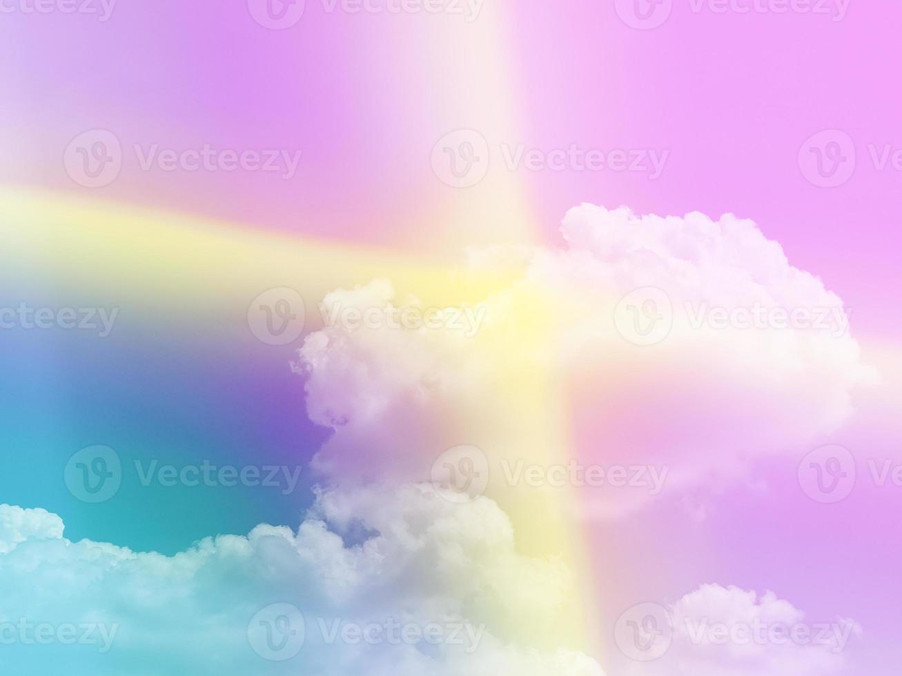 beauty sweet pastel violet yellow cross light colorful with fluffy clouds on sky. multi color rainbow image. abstract fantasy growing light photo