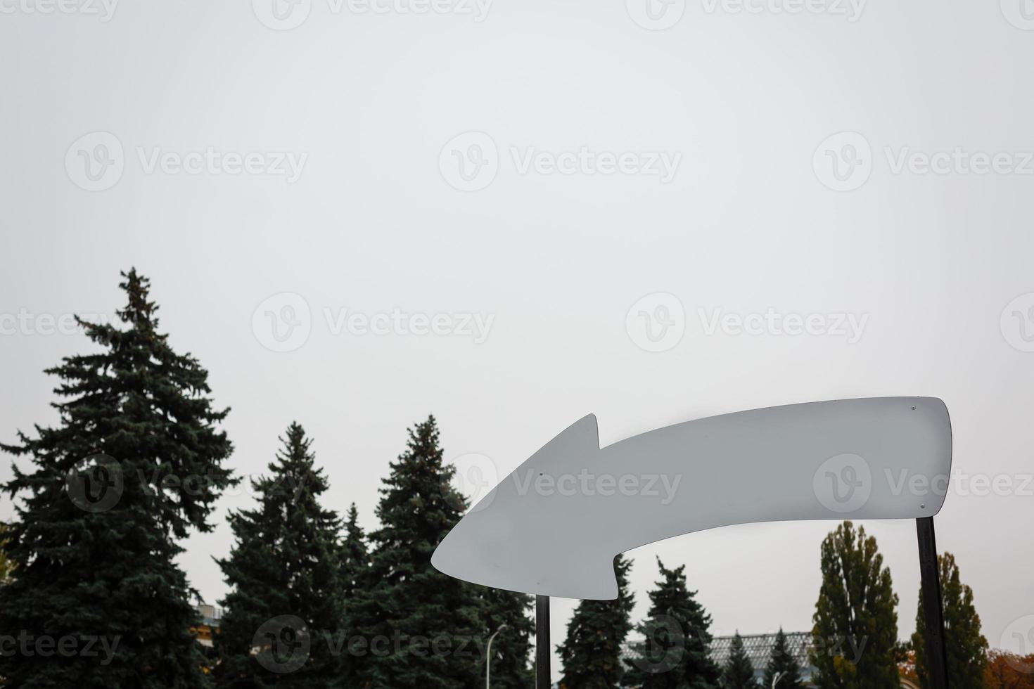 Wooden pointer arrow board for the inscription tourist concept photo