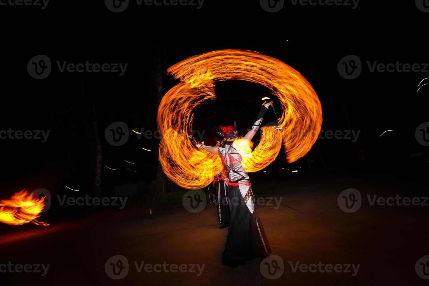 fire show and a lot of the bright sparks in the night photo