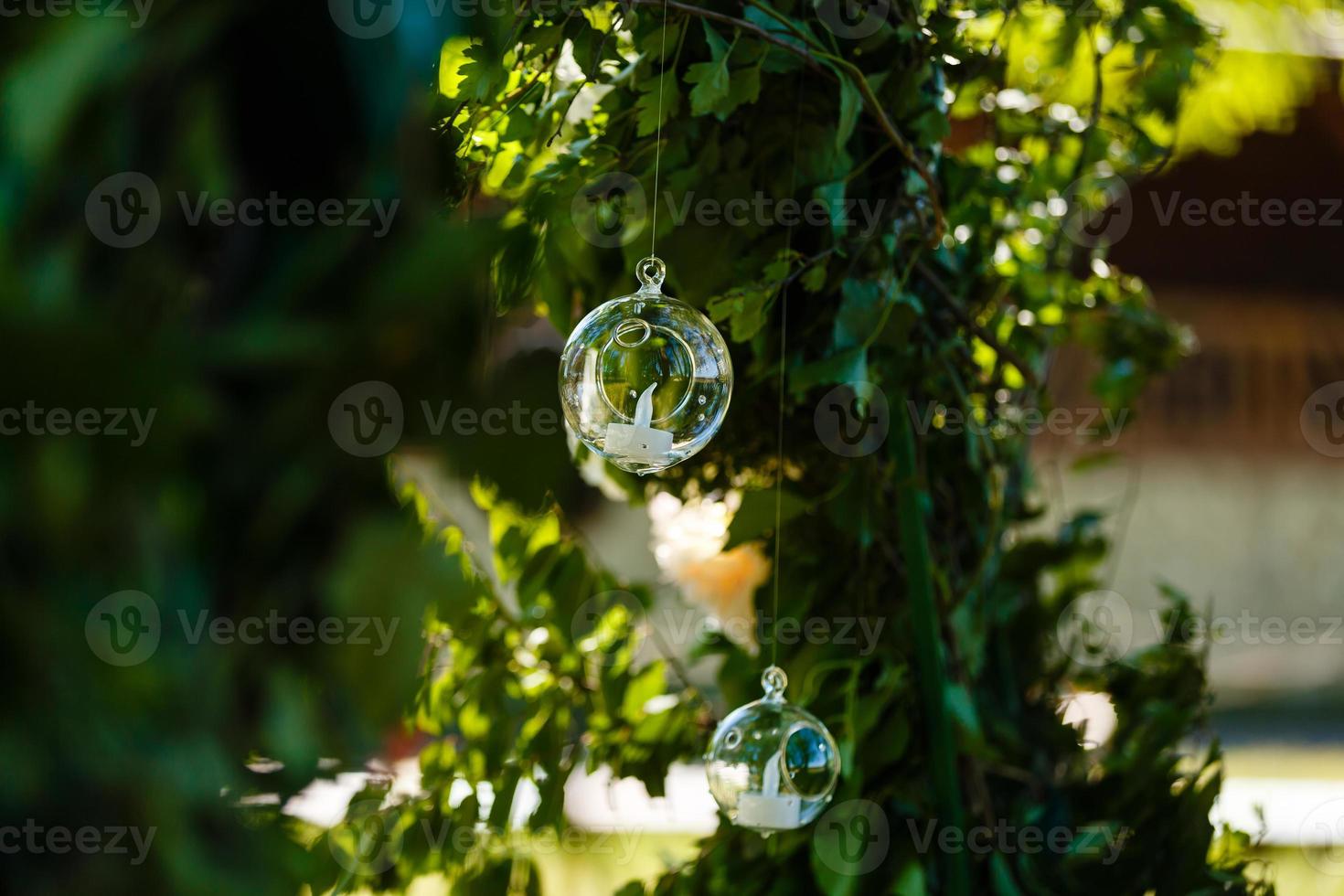 Original wedding floral decoration in the form of mini-vases and bouquets of flowers hanging from the ceiling photo