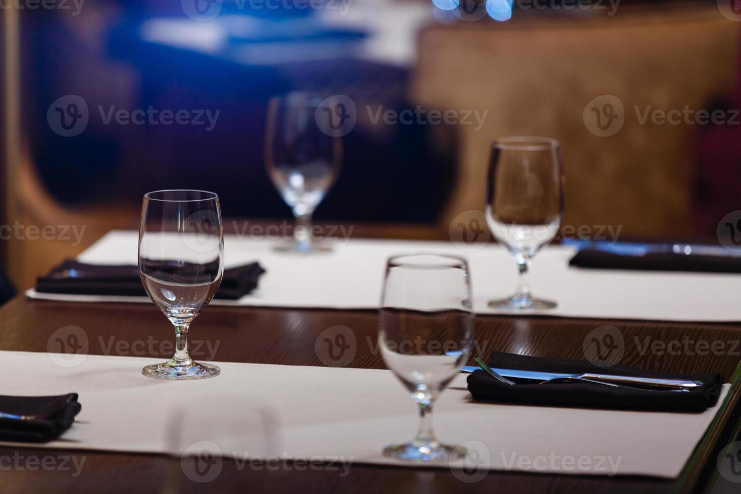 Glasses wine on table in sushi restaurant Serving in the restaurant on the table photo