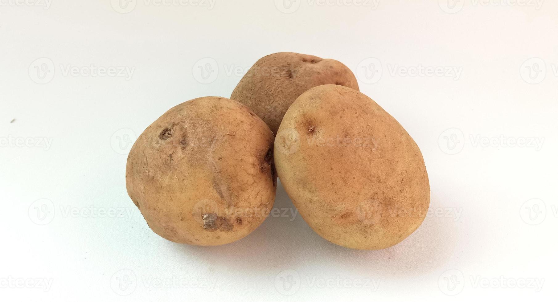 potato isolated on white background close up photo