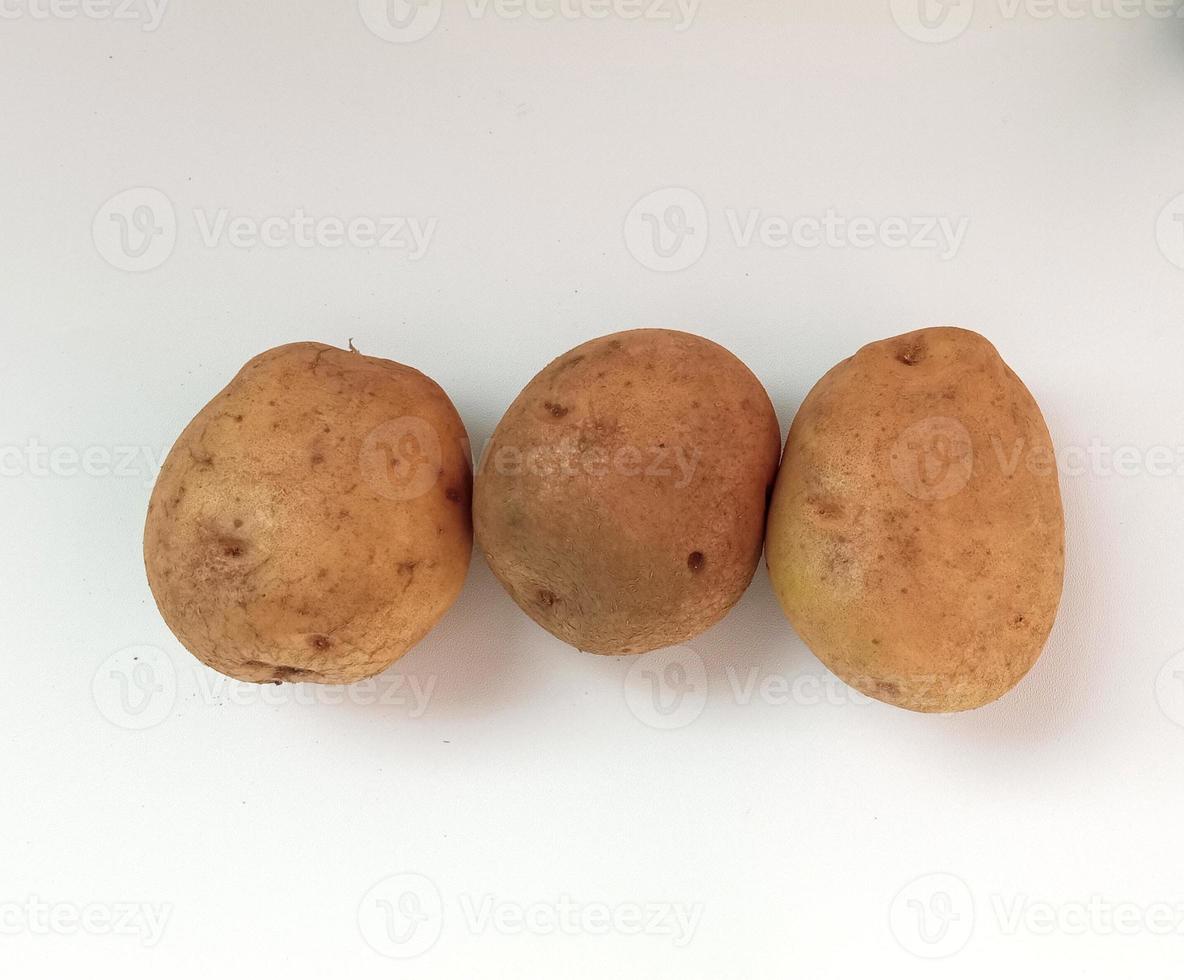 potato isolated on white background close up photo