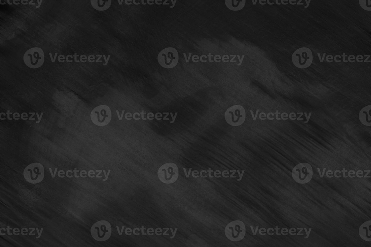 Black Cement scratch background. Texture placed over an object to create a grunge effect for your design. photo